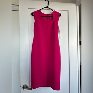 Calvin Klein dress, Size4, never used and still with the tag, for sale.